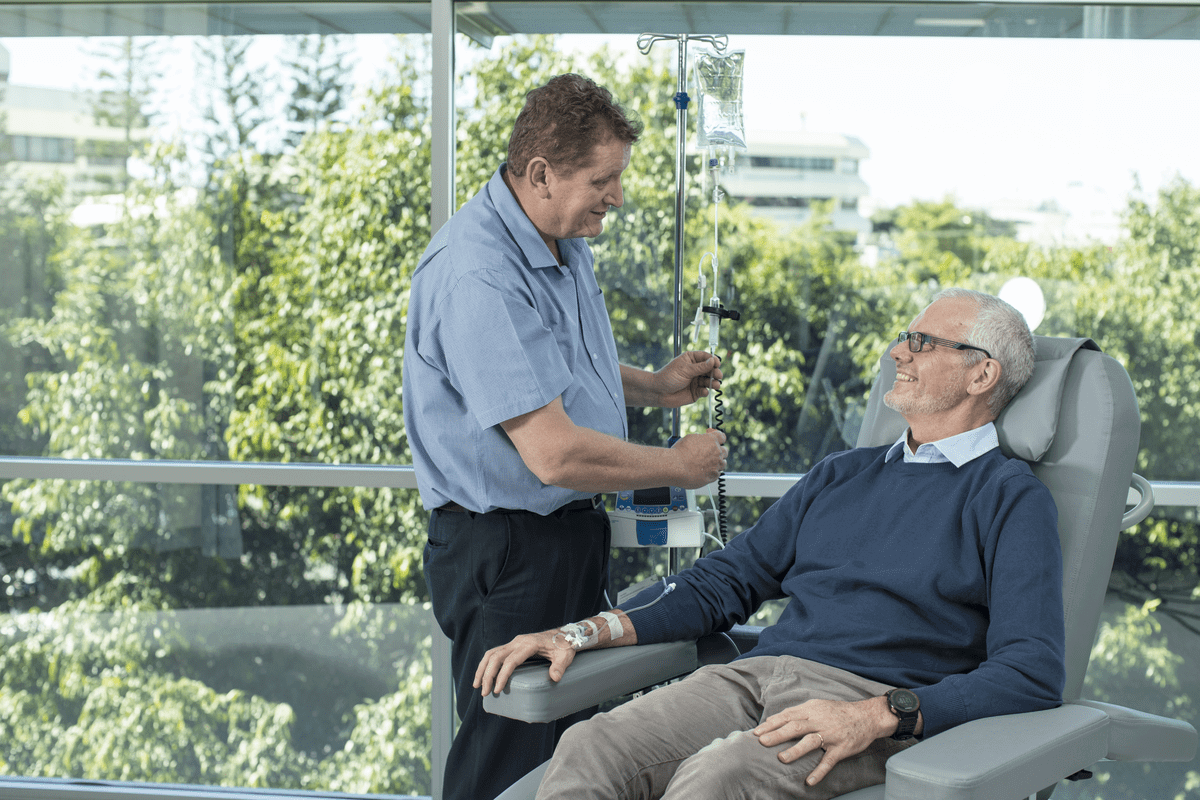 Male nurse and male patient at an Icon Group facility